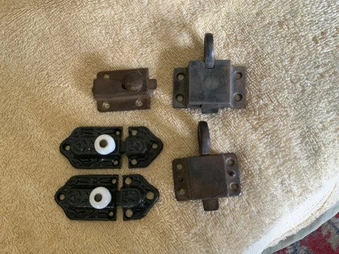 Antique salvaged door latches Cover