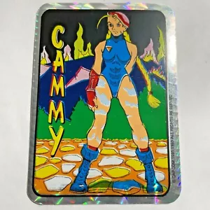 CAMMY - Adesivo Street Fighter Prism Vending - Capcom 1993 * RARO * - Foto 1 di 1