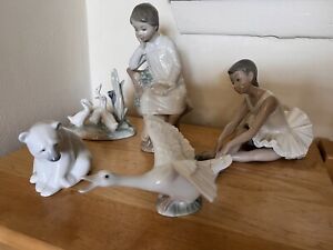 5 Lladro Figurines. Dancer, Bear, Lil Boy, & 2 Geese Figurines.