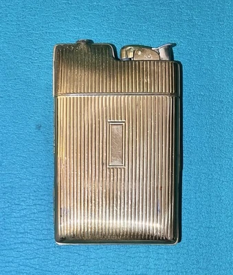 Estuche de cigarrillos MCM Evans vintage soporte encendedor combo tono dorado usado sin probar Foto 1 de 4