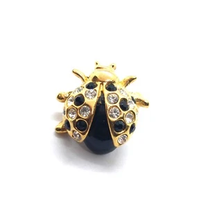 Prendedor de solapa Ladybug negro con pedrería tono dorado brillante insecto joyería regalo - Imagen 1 de 3