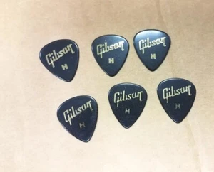 Lot of 6 Gibson Black /Gold Foil Heavy gauge Guitar Picks - Picture 1 of 3