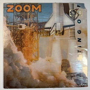 ZOOM - Blasting Off LP Vinyl 1983 (M/VG) sealed - Bild 1 von 9