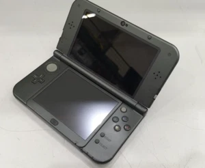 Console Nintendo nuova 3DS LL XL solo colori nero metallizzato usata giapponese Giappone F/S - Foto 1 di 13