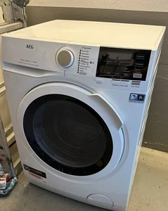 AEG Gebraucht L7WBA60680 freistehender Waschtrockner 8 kg Waschen AK 85 - Bild 1 von 8