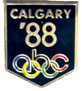 SPILLA NERA ORIGINALE VINTAGE 1988 ABC MEDIA CALGARY OLIMPIADI INVERNALI RETRO - Foto 1 di 2