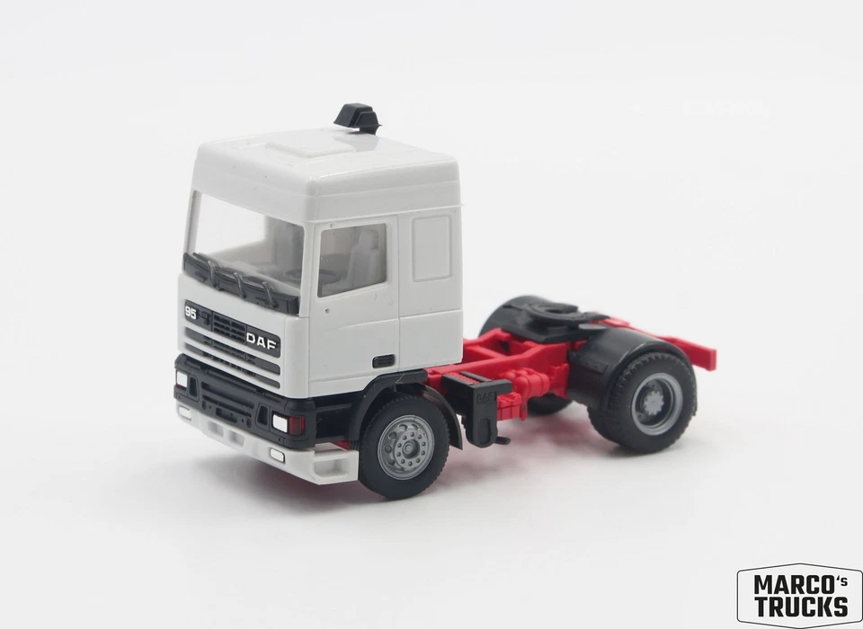 Herpa DAF 95 SC tractor unit 2-axle white/red/black 1:87 /H26219 - Image 1 of 1