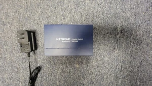 NETGEAR ProSafe GS108v4 8 Port Switch + AC Adapter - Picture 1 of 3
