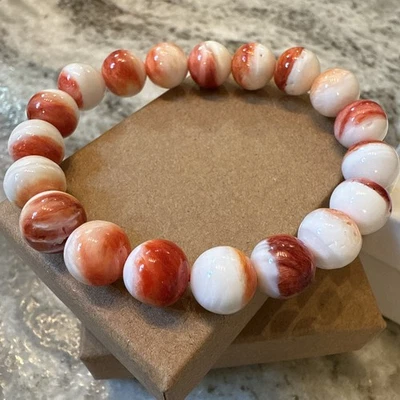 Brazalete de cuentas redondas elásticas con cuentas con concha de ostra espinosa naranja natural Foto 1 de 4