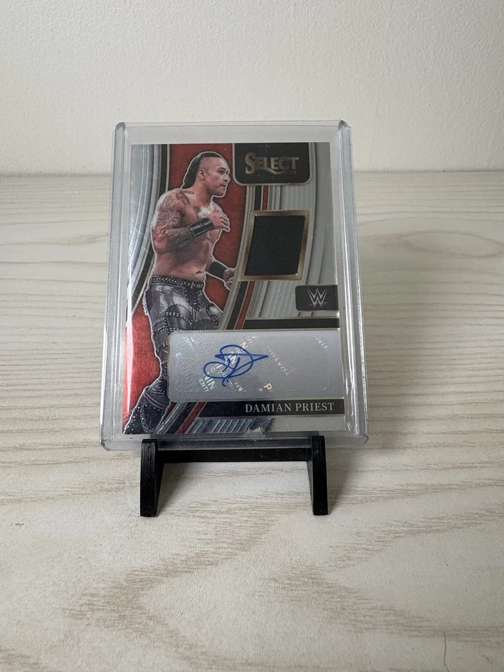 DAMIAN PRIEST 2022 PANINI SELECT WWE RELIC PRIZM AUTO  /199 - Image 1 of 2