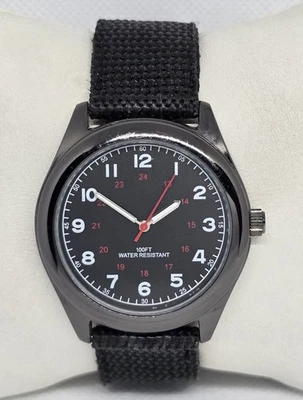 Reloj con correa de nailon tono plateado esfera negra redonda estilo militar FMD para hombre 09 Foto 1 de 4