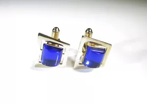 Goldfarbene Manschettenknöpfe mit quadratischem blauem Strass von Anson - Bild 1 von 5