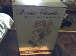 Ceramic musical windup angel - Picture 1 of 6