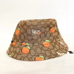 NWT Coach Signature Retro Orange Print Bucket Hat CAP90 size M - Picture 1 of 8