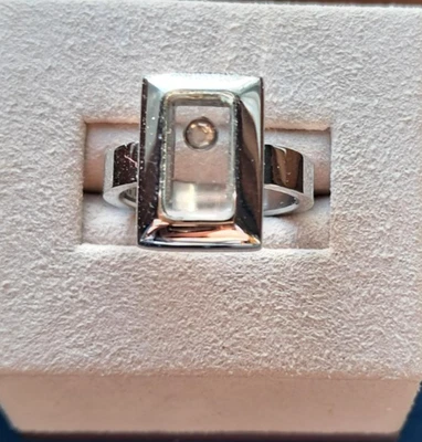 Anel de aço inoxidável INOX com tampo de vidro e pedra branca "flutuante" móvel - Imagem 1 de 4