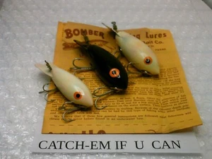 3 Bomber-mud bug-2 white- 1 black- 2-2 3/4 & 1-2 1/2 VINTAGE- CATCH-EM IF-U-CAN - Picture 1 of 8