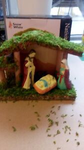 Small nativity set. Christmas ornament. Wooden stable with Ceramic figures.