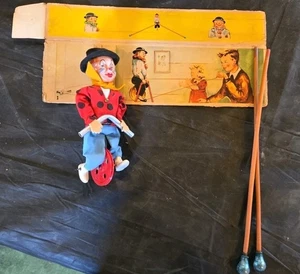 Payaso jinete cuerda floja años 50 de colección en monociclo juguete 8" de alto, hecho en W. Alemania - Imagen 1 de 10