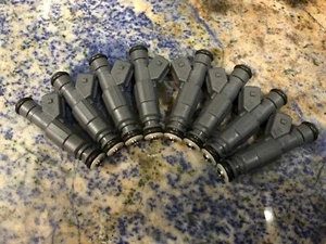 GENUINE BOSCH FUEL INJECTORS COMMODORE 5.7L V8 Gen-3 LS1 VT VX VY VZ HSV 99-2006 - Picture 1 of 3