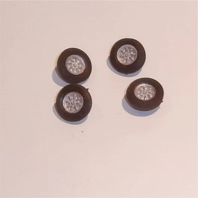 Corgi Toys  302 Hillman Hunter Golden Jacks Set of 4 Wheels & Tyres - Image 1 of 4