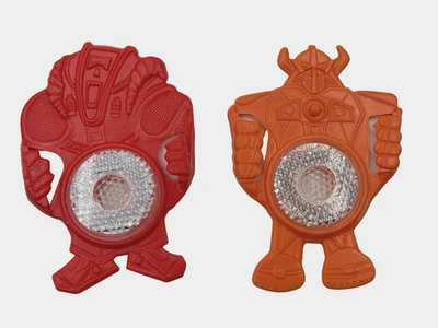 De colección 1985 Kellogg Cereal Premium Bicicleta Reflector Rojo y Naranja Robot Transformador Foto 1 de 4