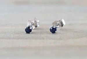 0.2ct Lab-Created Blue Sapphire 4 Prong Solitaire Stud Earring White Gold Plated - Picture 1 of 4