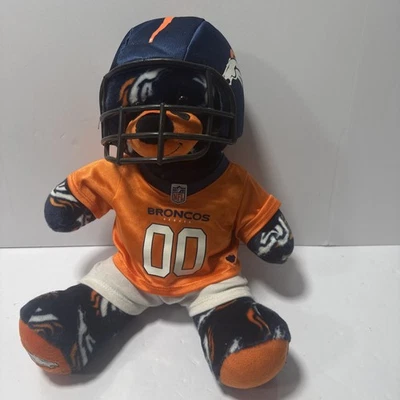 Casco de jugador de fútbol americano Build-A-Bear Workshop de peluche Bear of a Denver Broncos  Foto 1 de 4