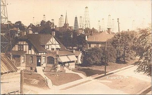 Evans City Pennsylvania View of Oil Drilling Rigs and Town RPPC 1915 - Picture 1 of 2