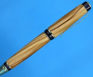 Bolígrafo Big Ben Gold and Gun Metal de dos tonos para cigarros con barriles de madera de olivo - Imagen 1 de 13