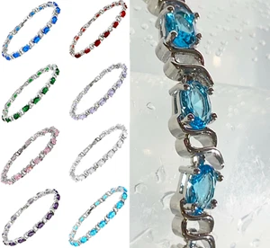 White gold filled tennis bracelets with oval cut created gemstones CRUISE BOXED - Picture 1 of 10