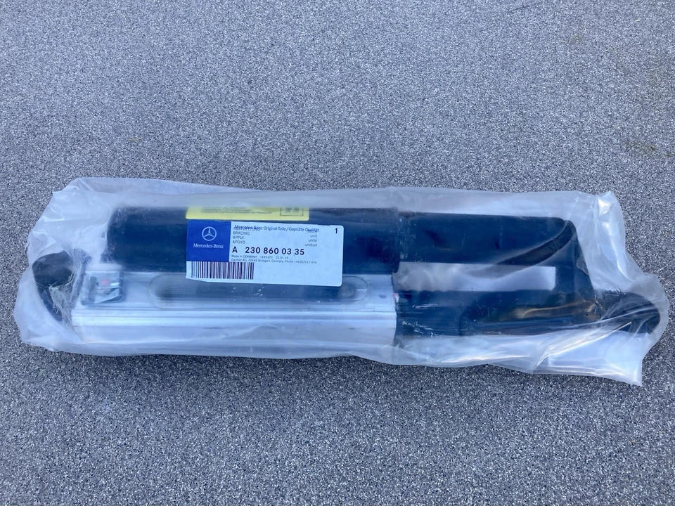 Genuine Mercedes 2308600335 Convertible Left Lock Pawl Cylinder Support R230 SL - Image 1 of 3