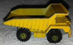 Hot Wheels Caterpillar Dump Truck Yellow (1979) - Picture 1 of 7