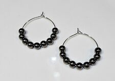 Black Hoop Earrings With Shiny Beads.