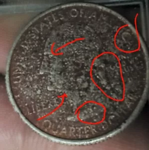 2007 Wyoming state quarter overstruck on unknown copper coin - Picture 1 of 4
