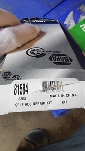 Kit de reparación autoajustador zapata freno trasero Napa 81584 Ford Nissan Ram 2010-2017 - Imagen 1 de 4