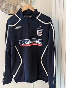 Suéter de entrenamiento azul de la selección nacional de Inglaterra 2007 para hombre talla XL Umbro - Imagen 1 de 8