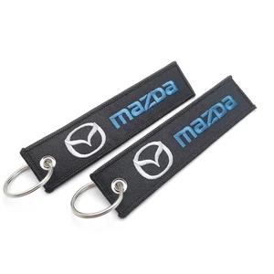 2PCS Embroidered Car Keychain Jet Tag Key Chain Ring Double Sided Logo for Mazda - Foto 1 di 1