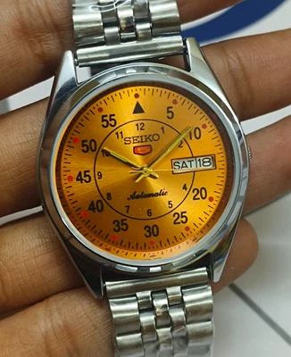 Orologio da polso uomo vintage Seiko 5 arancione automatico 17 gioielli giorno/data Giappone 6309 - Immagine 1 di 4