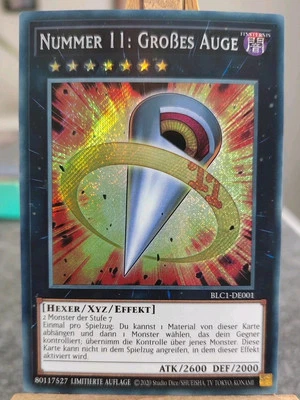 NUMMER 11: GROßES AUGE - BLC1-DE001 Secret  Rare / Near Mint  - Bild 1 von 2