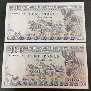 ** Rwanda 1989 Banknote Currency pair 100 Francs total 2 pcs - UNC - Picture 1 of 6