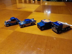 JUEGO DE 4 COCHES DE CARRERAS HOT WHEELS - Imagen 1 de 2