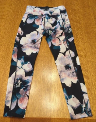 Calzas florales Calvin Klein Performance para mujer de 7/8 de longitud - talla pequeña Foto 1 de 4