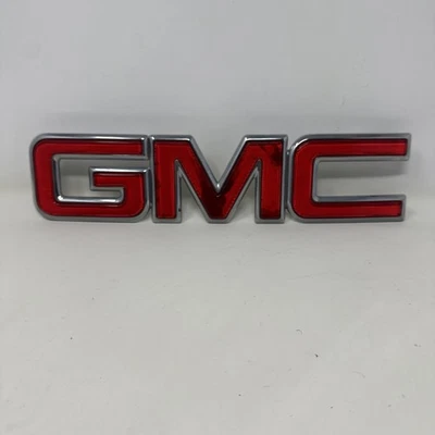 GMC Envoy 2002-2009 parrilla delantera emblema insignia logotipo placa de identificación nombre 15005589 OEM Foto 1 de 4