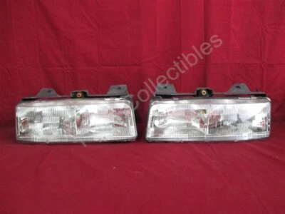 NOS OEM Pontiac Trans Sport Olds Silhouette, Lumina APV Headlight 1990 - 93 PAIR - Image 1 of 4
