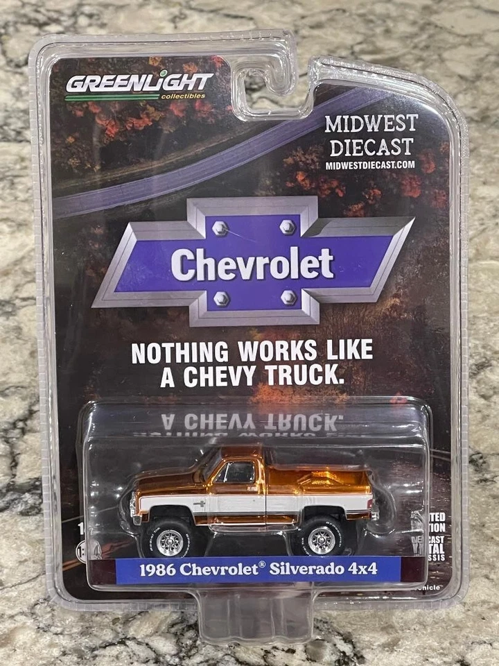 Greenlight SUPER CHASE 1986 Chevrolet Silverado 4 x 4 Orange Chrome & White 1/64 - Image 1 of 1