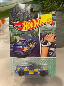 BMW M2 Police Die Cast Car 2016 Hot Wheels - azul amarillo - 3/5 - Imagen 1 de 1