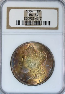 ☀️"SUNBURST"☀️ 1884 MORGAN SILVER DOLLAR NGC MS64🌈GOLD, ORGANGE, PINK, BLUE🌈 - Picture 1 of 4