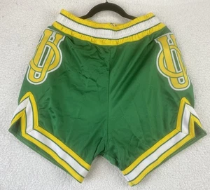 PANTALONES CORTOS DE BALONCESTO OREGON DUCKS de colección para mujer emitidos por el equipo usado en el juego universidad - Imagen 1 de 10