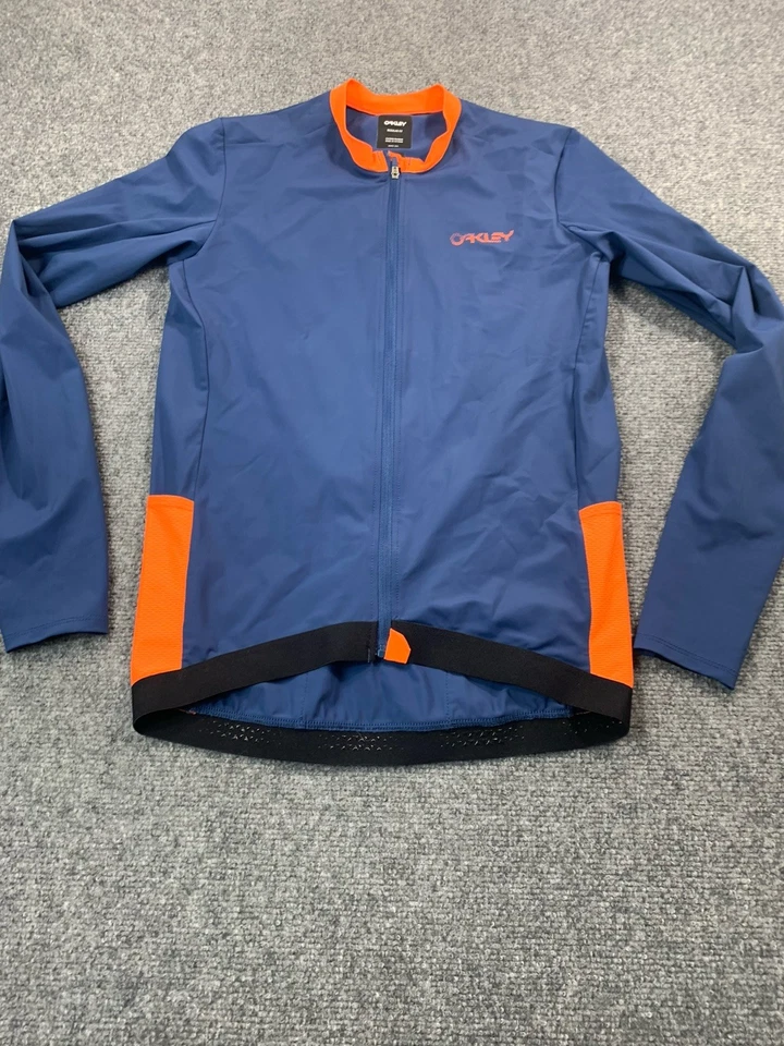 Camisa Oakley para mujer azul mediana manga larga cremallera completa ciclismo reflectante elástica Foto 1 de 4