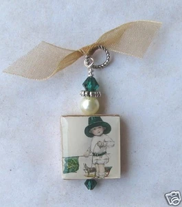 St. Patrick's Day Pendant Irish Boy in Green Hat With Flag Vintage Art Charm - Picture 1 of 1
